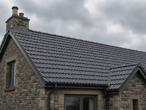 Grey tiled roof on a Scottish stone property